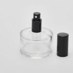 2 oz (60ml) Puck-shaped Clear Bottle with Fine Mist Spray Pumps